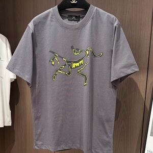 Arc'teryx Grey Tee with Neon Yellow Graphic